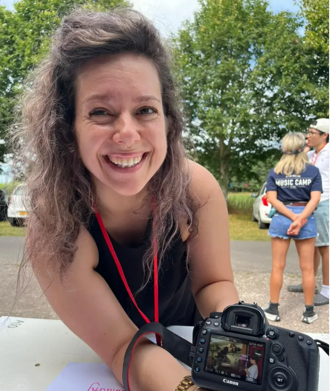 Lucy Lamb on the job, camera in hand